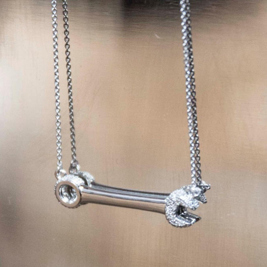 Lifestyle image of Crank It Up silver Wrench necklace by Pavé The Way® Jewelry
