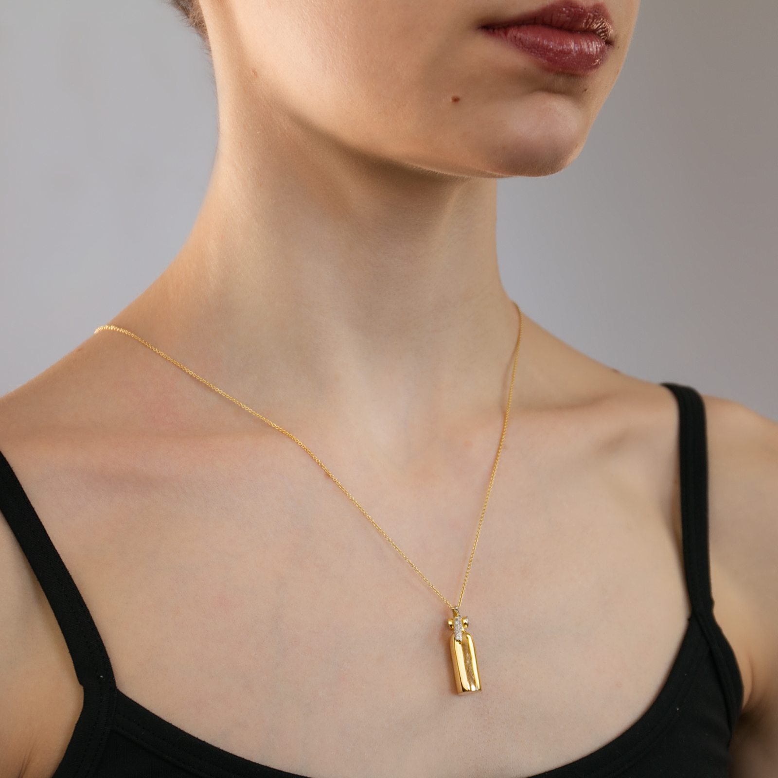 Extinguish Hate gold-plated Fire Extinguisher necklace by Pavé The Way® Jewelry
