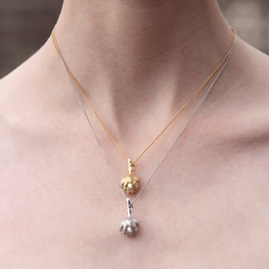 Load image into Gallery viewer, Model wears Get To The Heart Of The Matter gold-plated and sterling silver Artichoke necklaces by Pavé The Way® Jewelry
