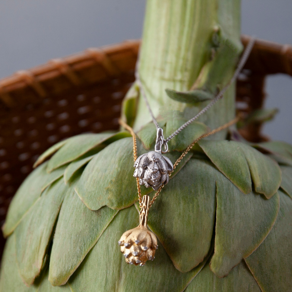 Lifestyle image of Get To The Heart Of The Matter gold-plated and sterling silver Artichoke necklace by Pavé The Way® Jewelry