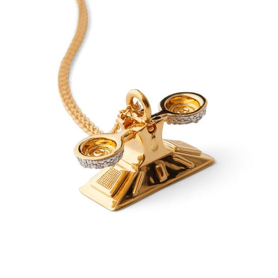 Detail view of Equal Pay For Equal Work gold-plated Scale necklace by Pavé The Way® Jewelry