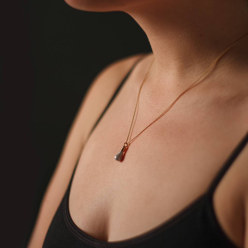 Load image into Gallery viewer, Model wears Genius! Light Bulb necklace by Pavé The Way® Jewelry
