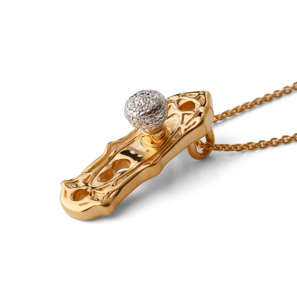 Side view of Check Your Bias At The Door gold-plated Door knob necklace by Pavé The Way® Jewelry