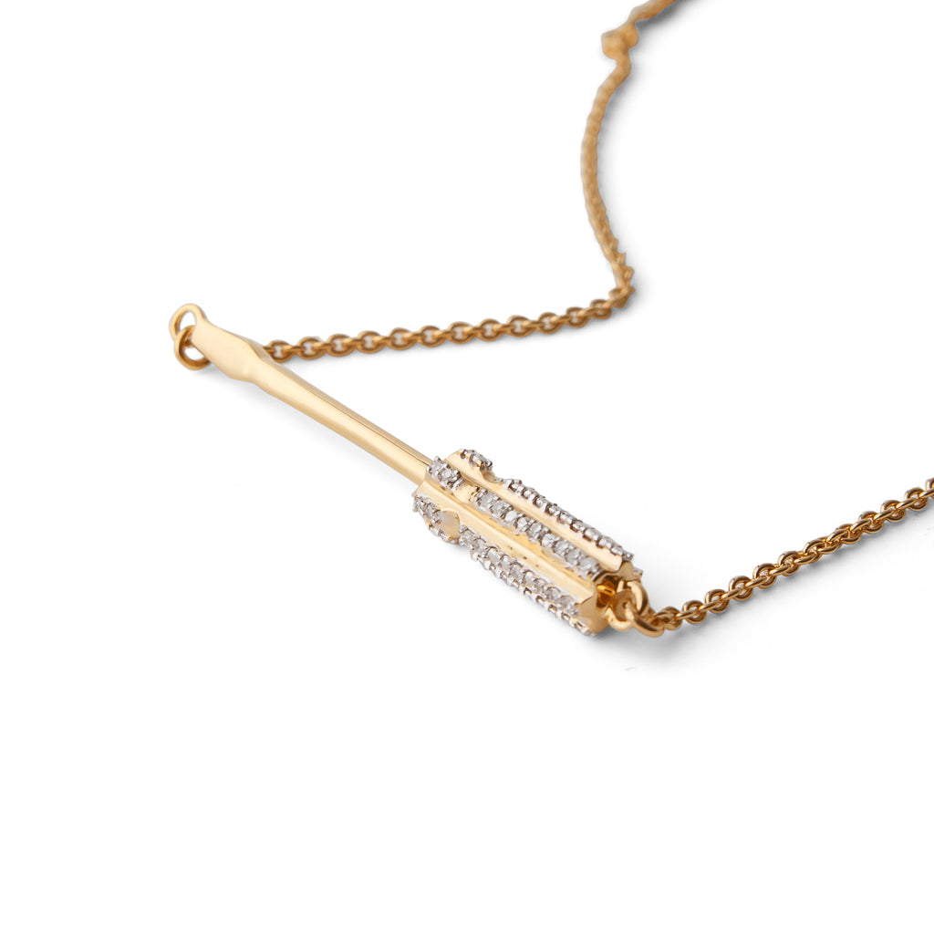 Detail view of Grace With Grip gold-plated Screwdriver necklace by Pavé The Way® Jewelry