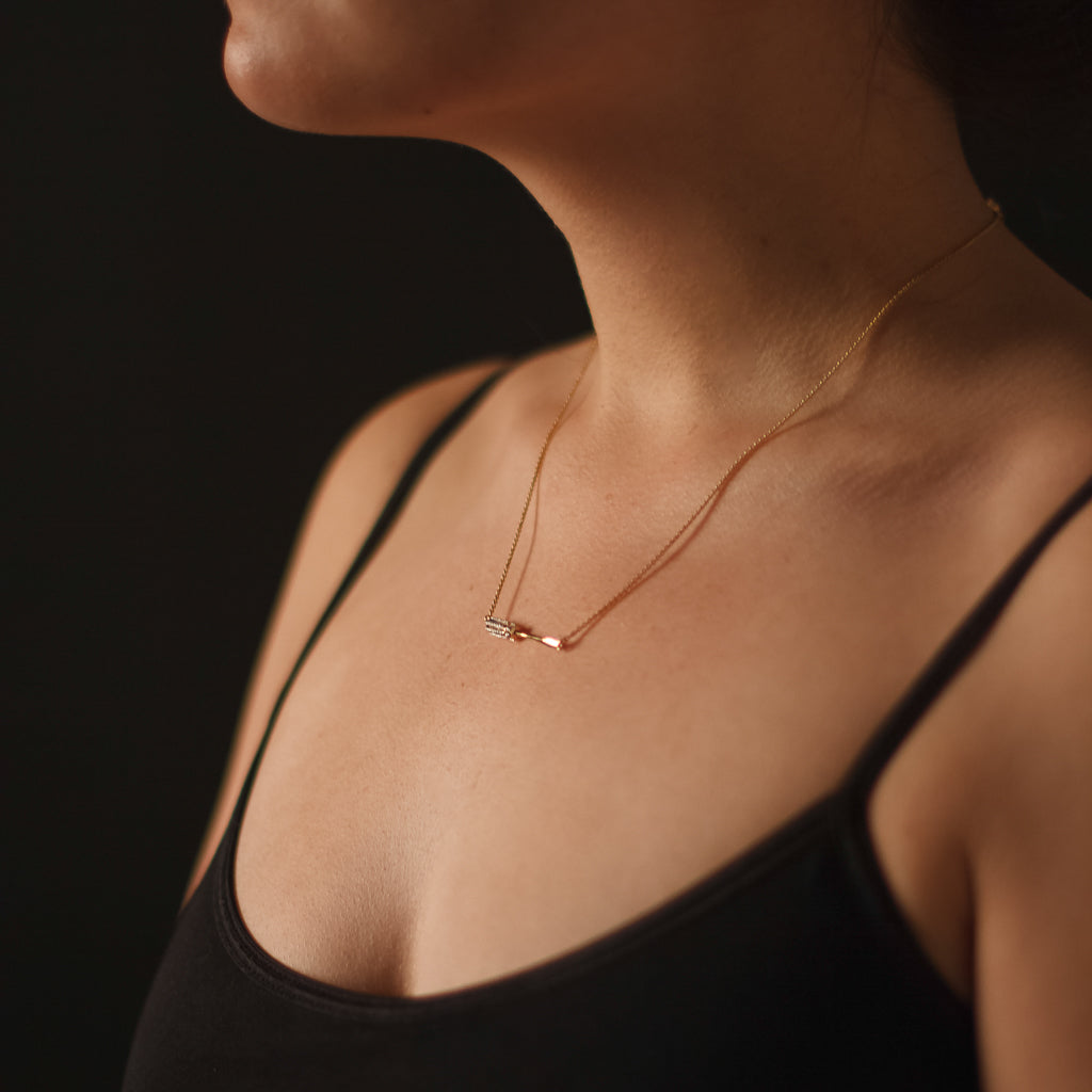 Model wears Grace With Grip Screwdriver necklace by Pavé The Way® Jewelry