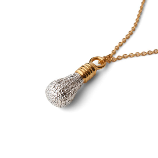 Side view of Genius! gold-plated Light Bulb necklace by Pavé The Way® Jewelry