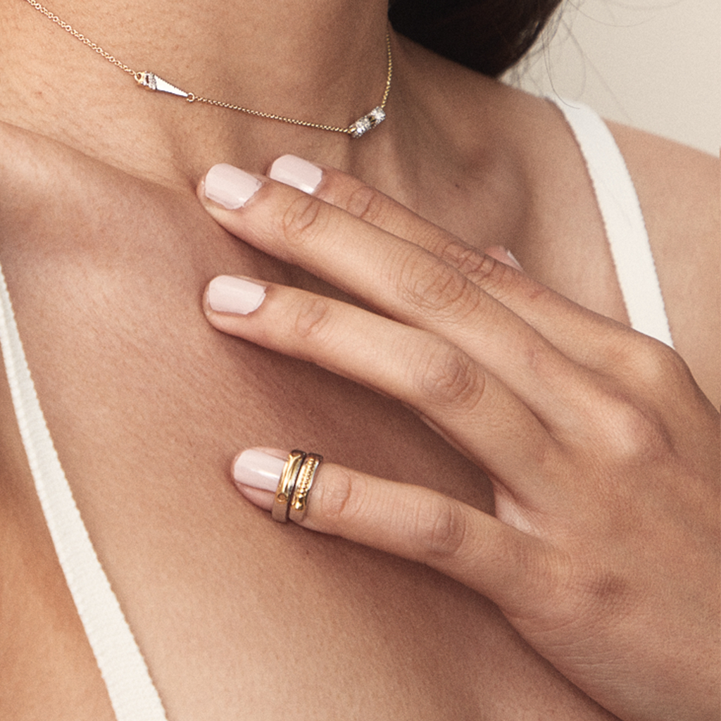 Model wearing Band Together + Get To Work Midi Rings by Pavé The Way® Jewelry